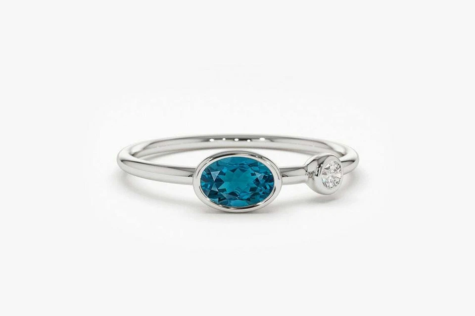 Lunelume Topas-Diamantring aus Silber mit elegantem Design